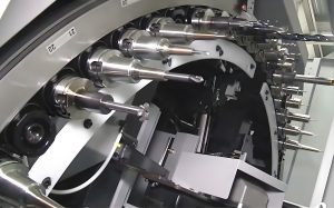 What is the linkage control and multi-axis machining of CNC machine tools?