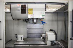 What causes oil leakage in CNC machining centers?