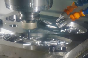 What are the advantages of CNC machining compared with manual machining?