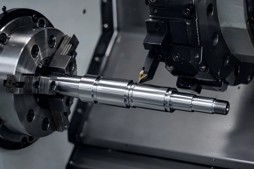 CNC turning of a stepped shaft component with grooves, shoulders, and external thread features on a precision lathe.