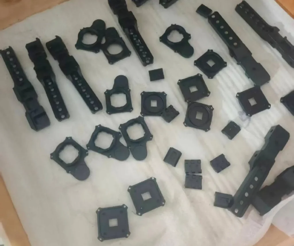 Batch of CNC machined engineering plastic components prepared for assembly and inspection.