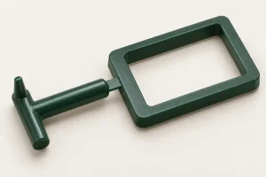 Illustration of a molded plastic bezel connected to a cold runner by a narrow edge gate.