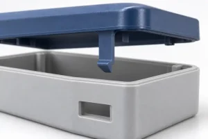 Illustration of a molded enclosure lid with an integral snap-fit latch aligned with its mating housing.